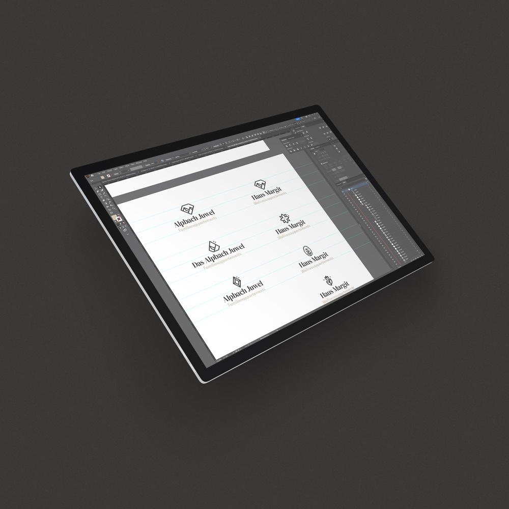 Logo-Entwürfe für Das Alpbach Juwel auf einem Grafiktablet