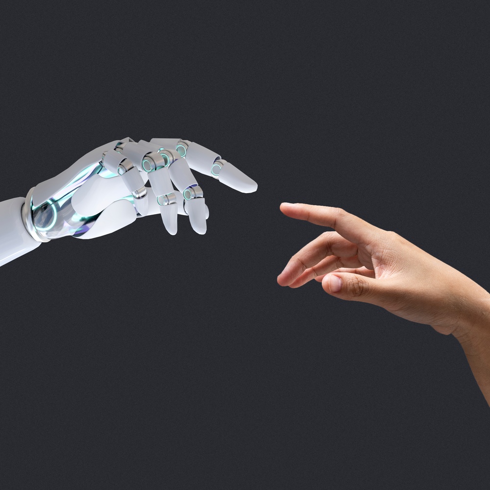 Roboterhand und menschliche Hand berühren sich mit den Zeigefingerspitzen